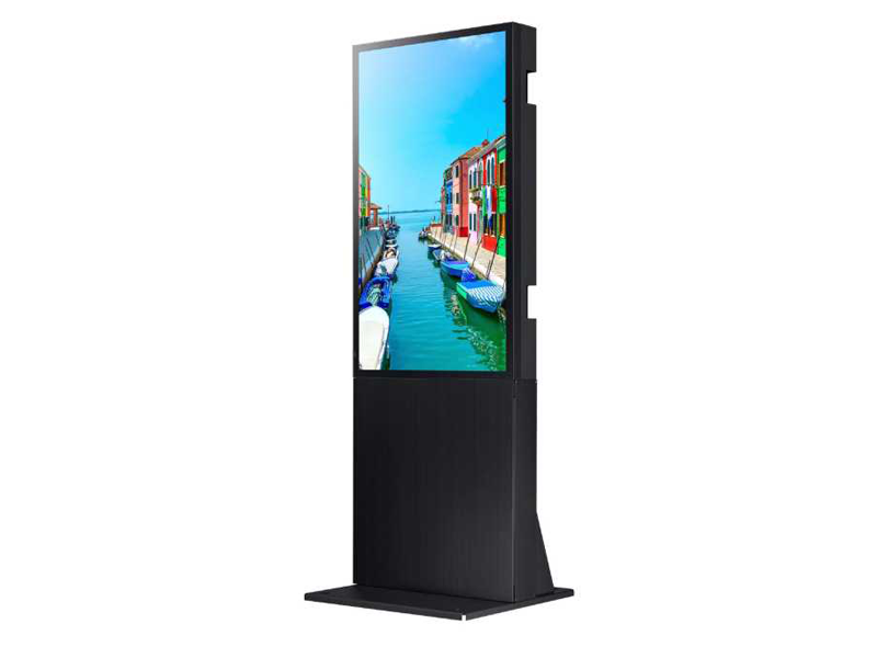 Samsung 55 Inch One-Sided Display Stele (OH55D-K with STN-E55D stand) shows a vibrant image of boats moored by multicolored buildings along a sunlit canal, demonstrating the screen’s bright and vivid visual quality.