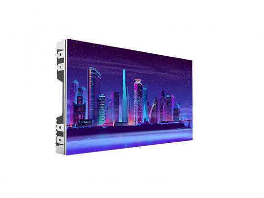 Flat rectangular LED display screen (cityscape model) showing a vivid, futuristic city skyline at night with tall illuminated skyscrapers and a purple-lit sky; the screen is angled to highlight its slim, modern profile.