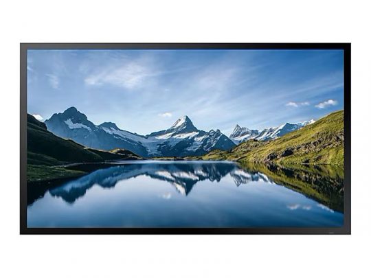 Framed photograph of snow-capped mountains and green hills reflected in a calm lake under a bright blue sky; landscape wall art print for home or office decor.
