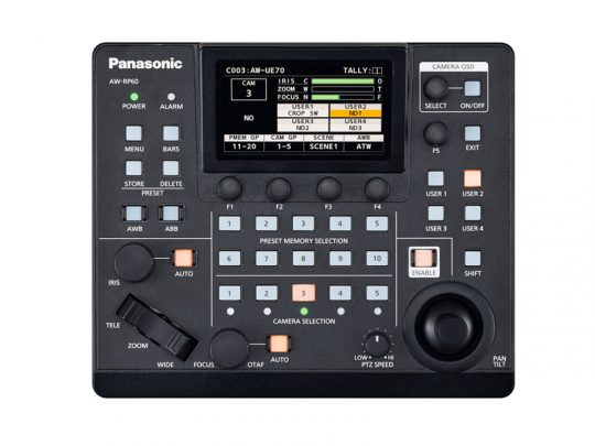 Panasonic AW-RP60GJ remote camera control unit in black, designed for PTZ cameras, featuring labeled buttons, dials, a joystick, and an LCD display screen for adjusting camera settings like zoom, focus, and selection; available for rent.