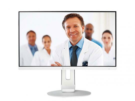Computer monitor displaying an image of a smiling male doctor in a white coat, blue shirt, and tie, standing in front of a group of healthcare professionals; perfect for medical website templates or telehealth platforms.