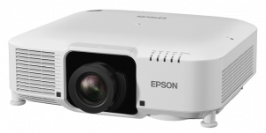 White Epson projector with a large central lens, vented sides, and top control buttons on a white background. Buy Epson projectors for clear, vibrant presentations.