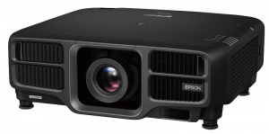 Black Epson projector with central lens, vented sides, and four adjustable feet, designed for high-quality image projection. Buy Epson projectors for reliable performance and stunning visuals.