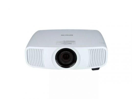 Epson projector front view: A white Epson projector with a central lens and side vents, displayed against a plain white background.