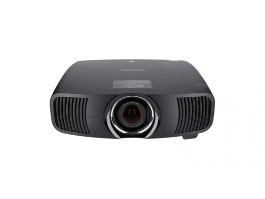 Front view of a black Epson projector, featuring a central lens and vented sides, shown on a plain white background. The sleek projector is designed for home or office use with efficient cooling vents.