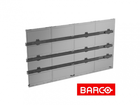 Transparent section of a BARCO modular LED video wall system, showing visible mounting brackets and internal components; BARCO logo in red and white is at the bottom right corner.