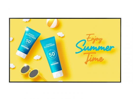 Two blue sunscreen tubes labeled Sunscreen, black sunglasses, a colorful beach ball, and small white cloud cutouts arranged on a bright yellow background with the words Enjoy Summer Time written in bold orange and blue letters. Perfect summer essentials flat lay for sun protection and outdoor fun.
