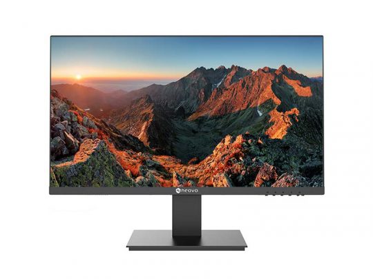 Moderner Computer-Monitor mit dünnem Rahmen und rechteckigem Standfuß, zeigt ein lebendiges Berglandschaftsbild mit Sonnenaufgang oder Sonnenuntergang, bei dem warmes Licht auf felsige Gipfel fällt. Ideal für natürliche Farbdarstellung und gestochen scharfe Bildqualität.